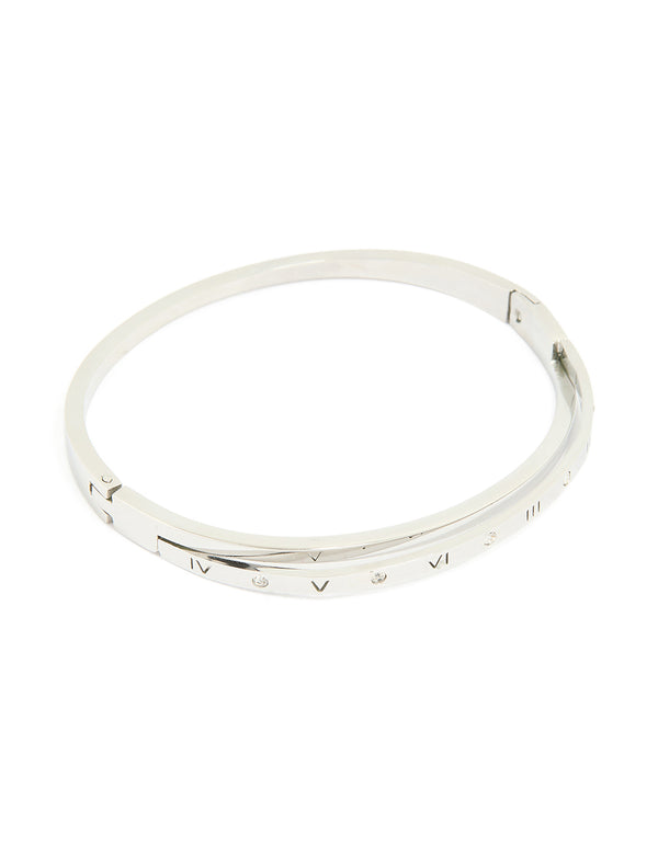 Displaying a waterproof stainless steel diamante Roman numeral hinge bangle in silver with statement design front view