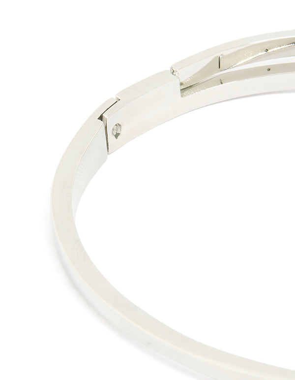 Presenting a waterproof stainless steel diamante Roman numeral hinge bangle in silver designed with secure fastening closure detail view