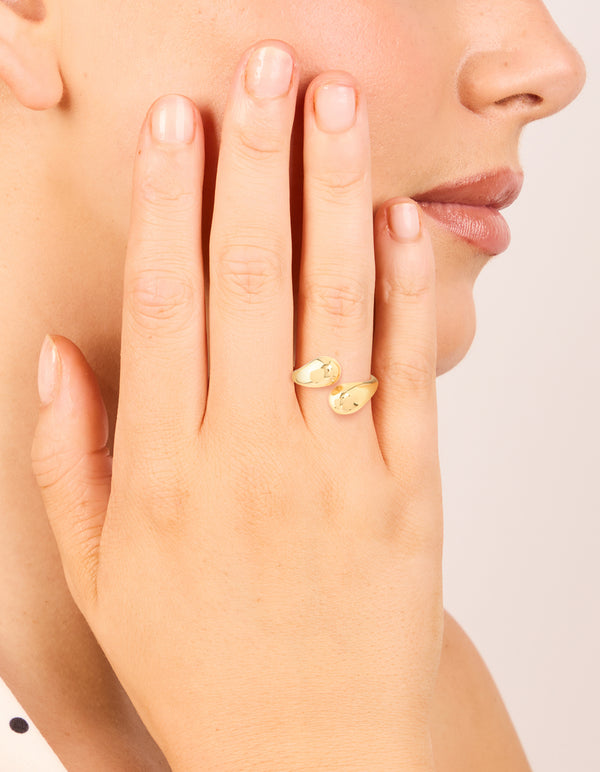 Featuring waterproof gold plated stainless steel double teardrop wrap around ring in chunky style on finger view