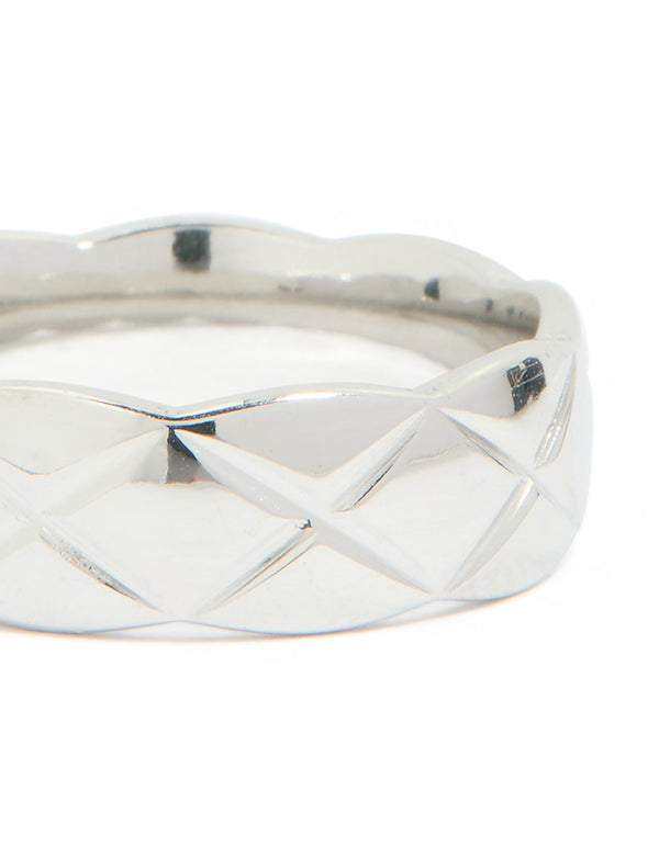 Highlighting a waterproof stainless steel crosshatch band ring in silver close up view
