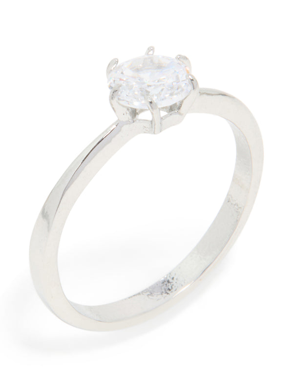 Featuring waterproof stainless steel construction, this diamante solitaire band ring in silver and clear stone with statement styling front view