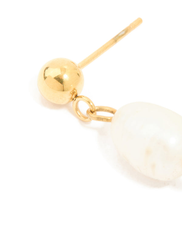 Designed with waterproof gold plated stainless steel, pearl stud drop earrings in white close up view