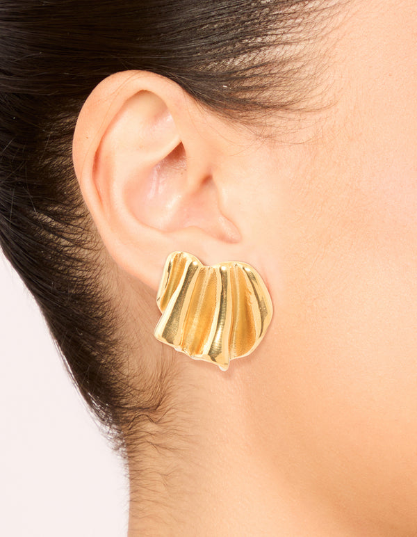 Featuring waterproof gold plated stainless steel wavy fan stud earrings on ear view