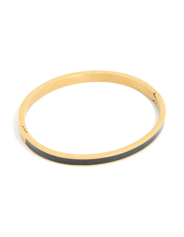 Featuring a waterproof hinged bangle crafted from gold plated stainless steel with thick black enamel in a dainty style front view