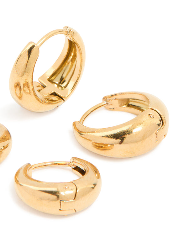 Designed with waterproof gold plated stainless steel thick oval huggie earrings in a 2-pack featuring chunky style post detail view