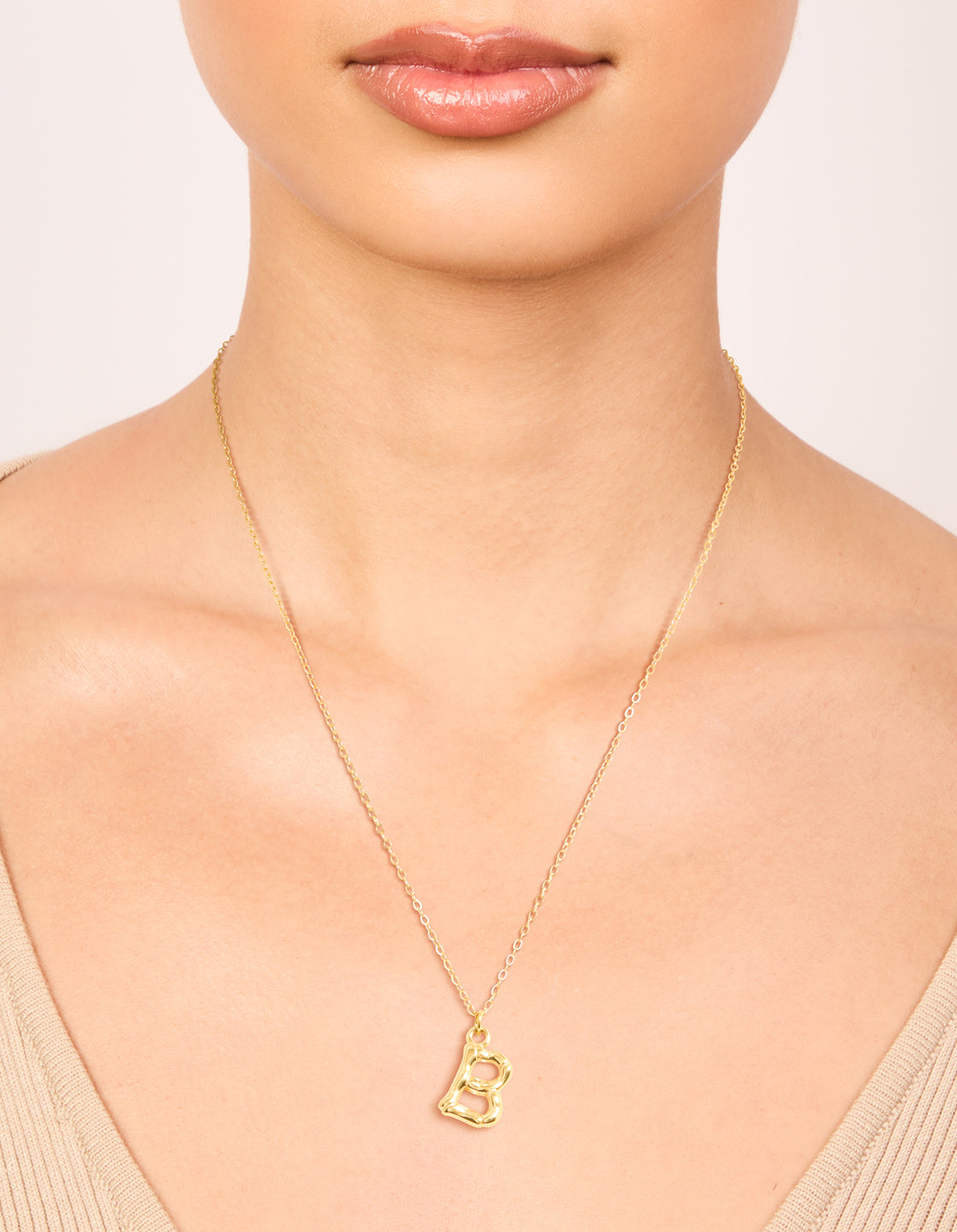 Elegant waterproof bamboo letter B necklace with initials feature crafted from gold plated stainless steel on neck view
