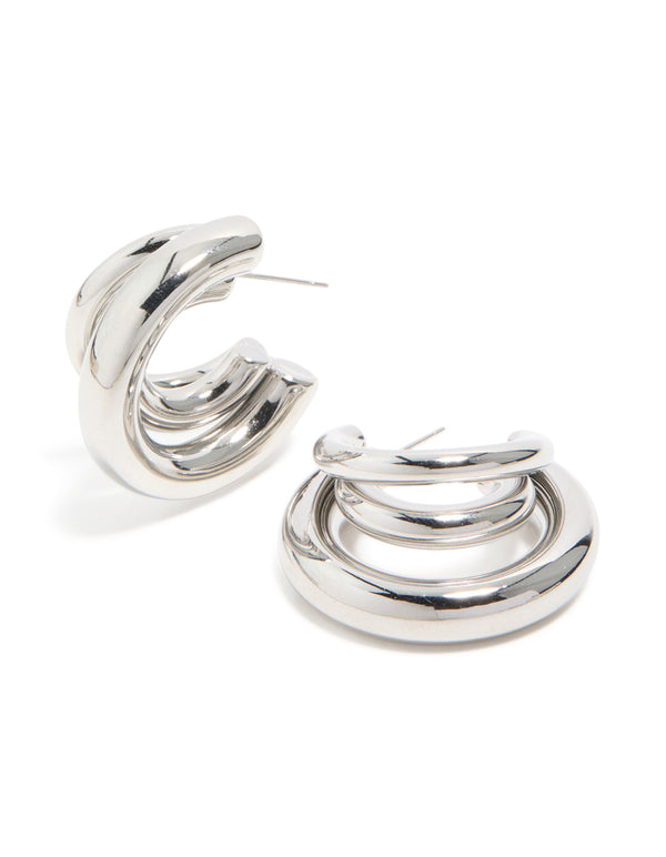 Featuring waterproof gold plated stainless steel triple illusion hoop earrings with statement design in silver front view