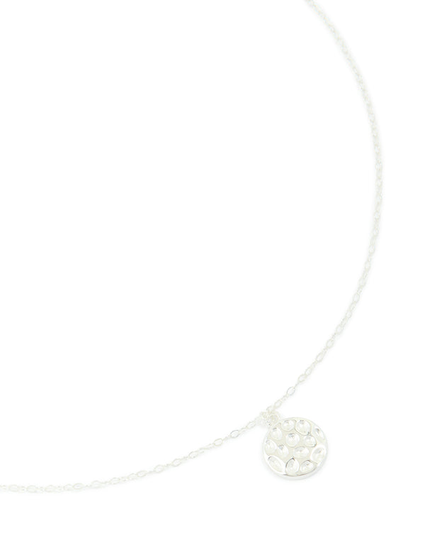 Featuring a sterling silver molten round pendant necklace close up view