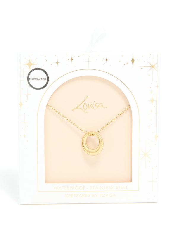 Featuring a waterproof disc pendant necklace in gold plated stainless steel close up view