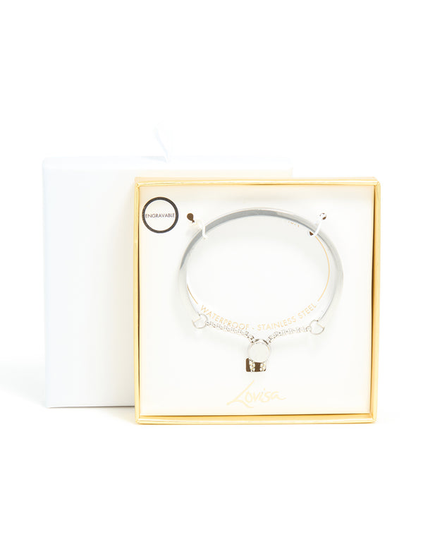Highlighting a waterproof adjustable toggle bangle crafted from stainless steel in silver front view