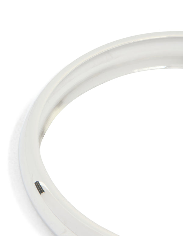Featuring a waterproof stainless steel round smooth bangle in silver close up view