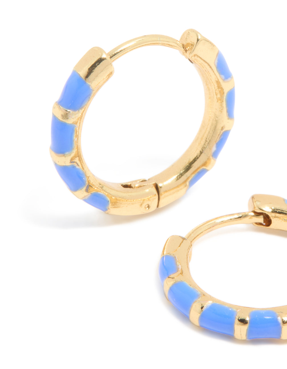 Highlighting the intricate bamboo texture and blue enamel detailing on waterproof statement huggie earrings crafted from gold plated stainless steel close up view