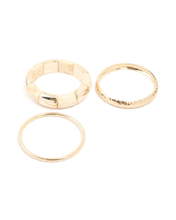 Featuring cream acrylic stretch bangle and bangles in a 3-pack front view
