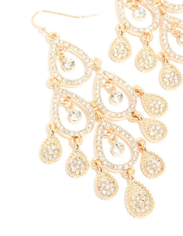Beautifully crafted gold diamante diamond shaped dangly earrings featuring charm close up view