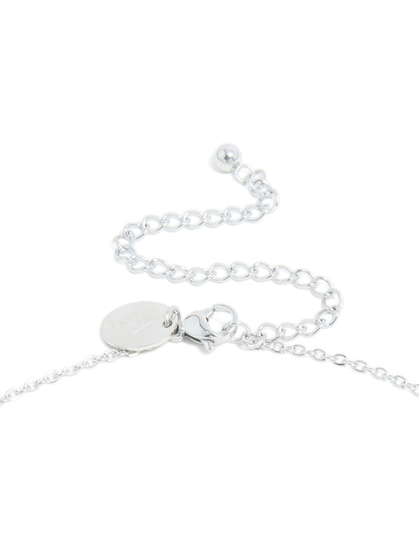 Explore this waterproof stainless steel mini bubble letter T necklace with initial pendant in silver clasp detail view