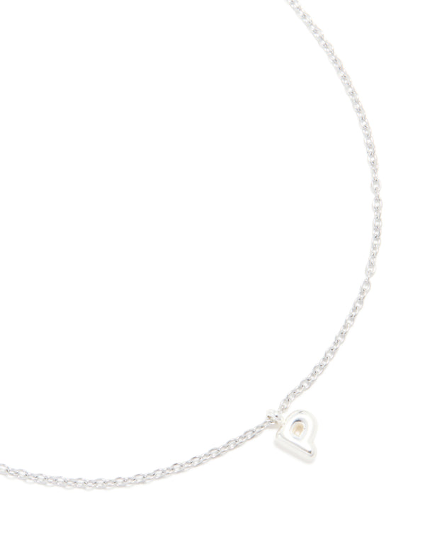 Showcasing a waterproof stainless steel mini bubble letter P necklace with pendant featuring initial detail and dainty silver design close up view