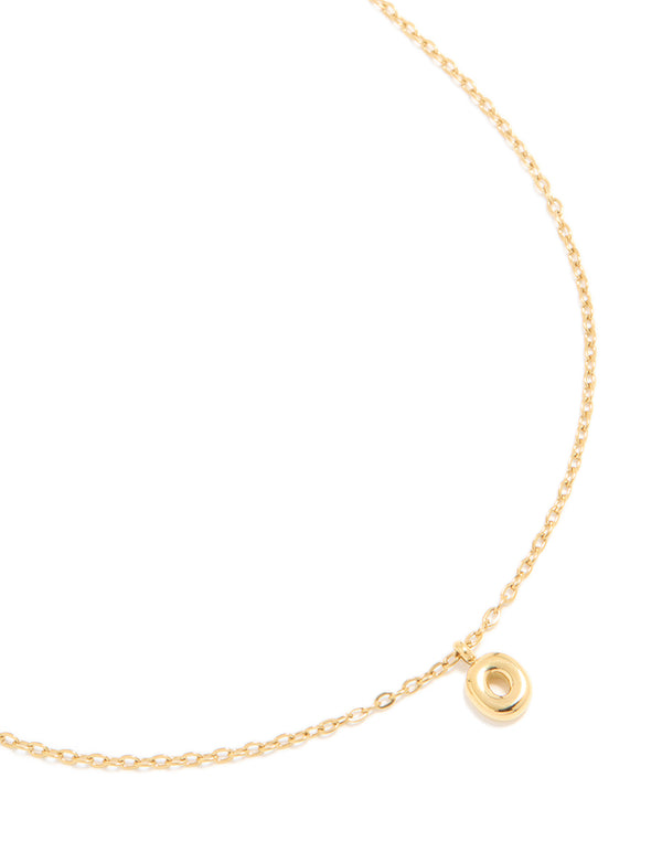 Crafted from waterproof gold plated stainless steel with a mini bubble letter O initial pendant necklace close up view