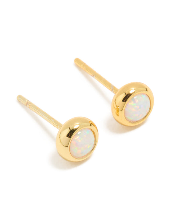 Featuring waterproof gold plated stainless steel opal October birthstone bezel set stud earrings in white front view