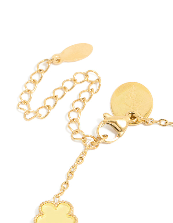 Displaying a waterproof gold plated stainless steel butter yellow flowers charm bracelet in a dainty style closure detail view