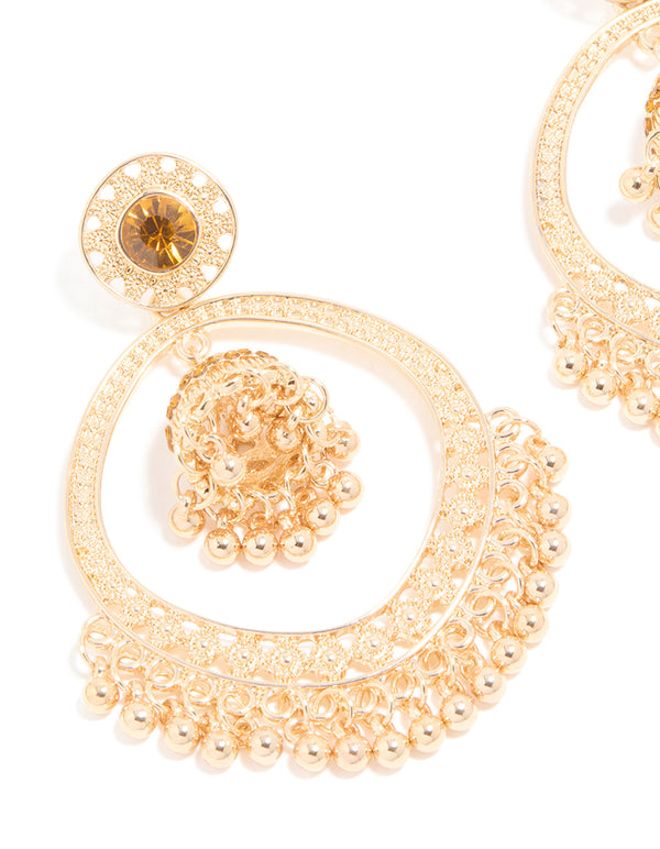 Crafted with gold circle boho drop earrings featuring beads and charm close up view