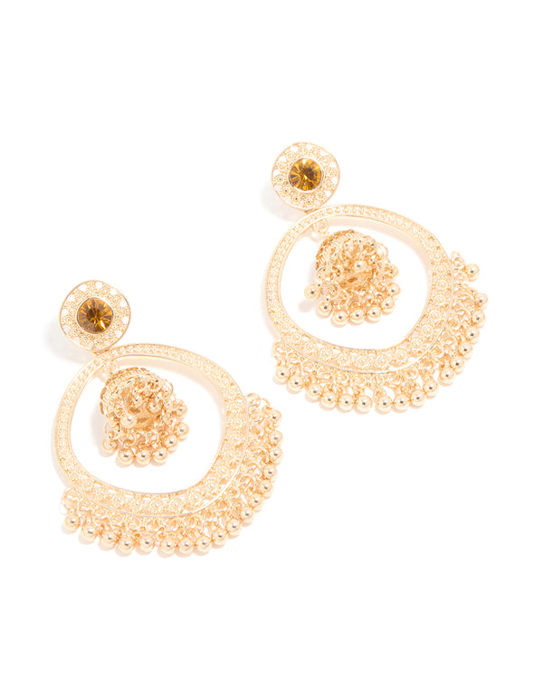 Showcasing gold circle boho drop earrings with beads and charm front view