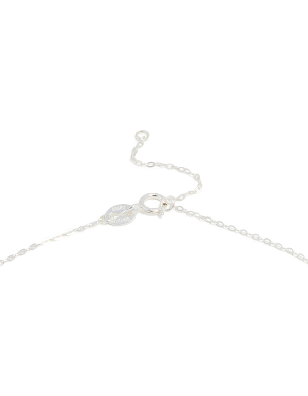 Presenting sterling silver round Mary pendant necklace with statement styling in silver clasp detail view
