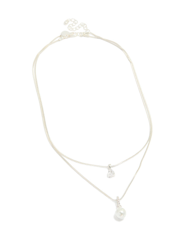 Featuring a silver plated double layered cubic zirconia and pearl necklace front view