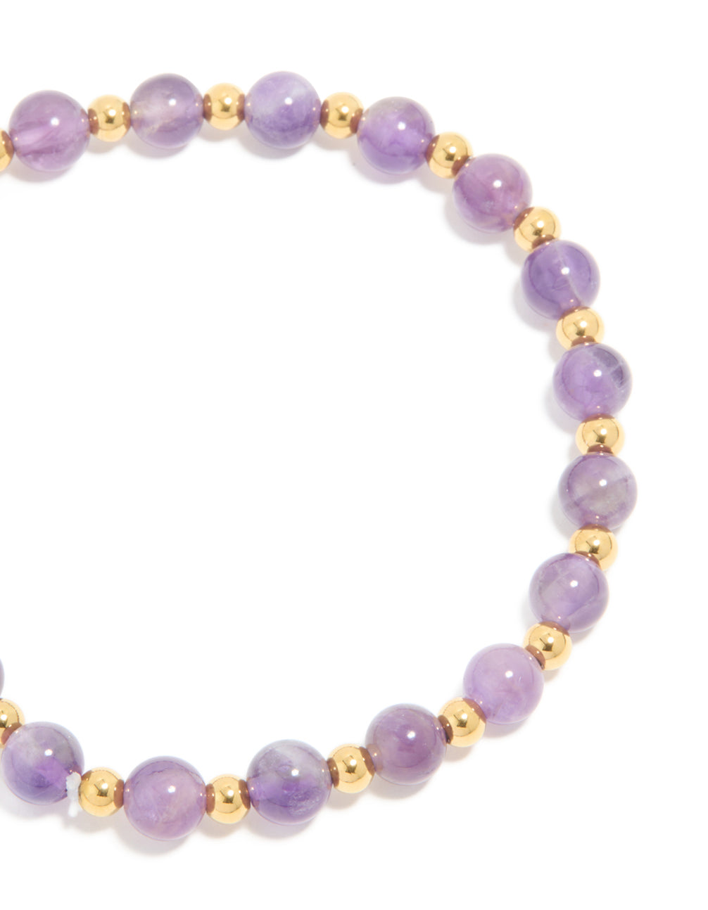 Detailed view of waterproof stretch bracelet featuring beaded amethyst semi precious stone and gold plated stainless steel close up view