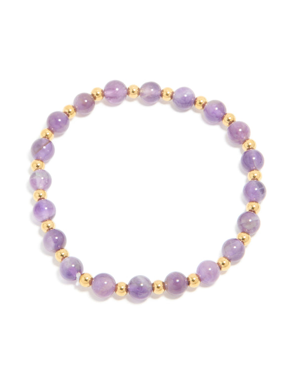 Beautifully crafted waterproof stretch bracelet featuring beaded amethyst semi precious stone with gold plated stainless steel accents front view