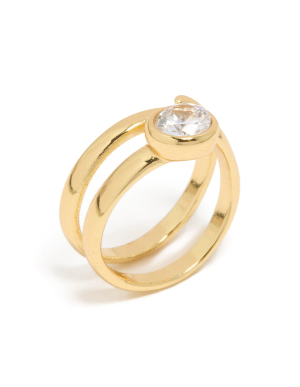 A waterproof gold plated stainless steel diamante swirl ring featuring clear stones and bezel setting side detail view
