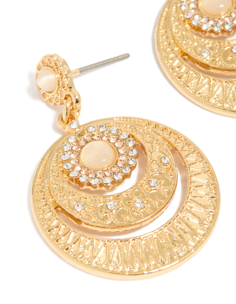 Detailed view of gold plated boho circle drop earrings close up view