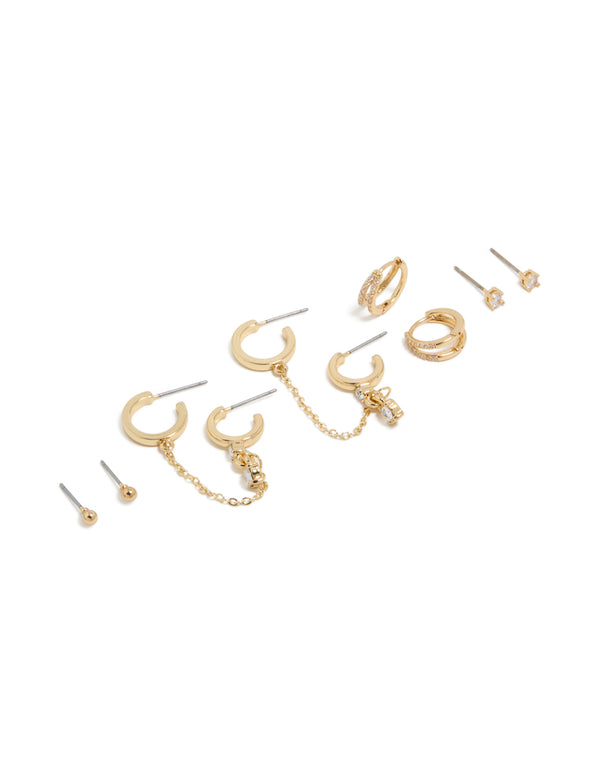 Showcasing gold plated cubic zirconia huggie and chain earrings in a 5-pack with featuring crystal embellishments and mixed hoop and stud closures front view
