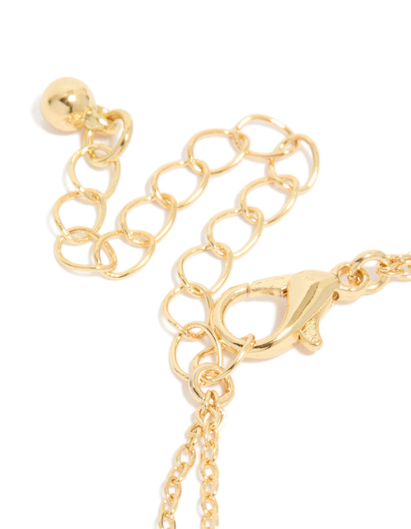 Presenting a dainty gold plated cubic zirconia flower and freshwater pearl layered bracelet closure detail view
