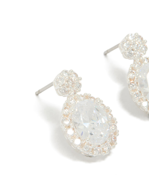 Stunning silver plated oval cubic zirconia medium drop earrings featuring clear tones close up view
