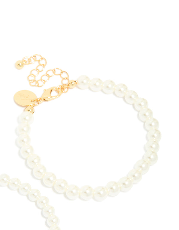 Highlighting Gold Plated Classic Pearl Bracelets 2-Pack designed in white and gold close up view