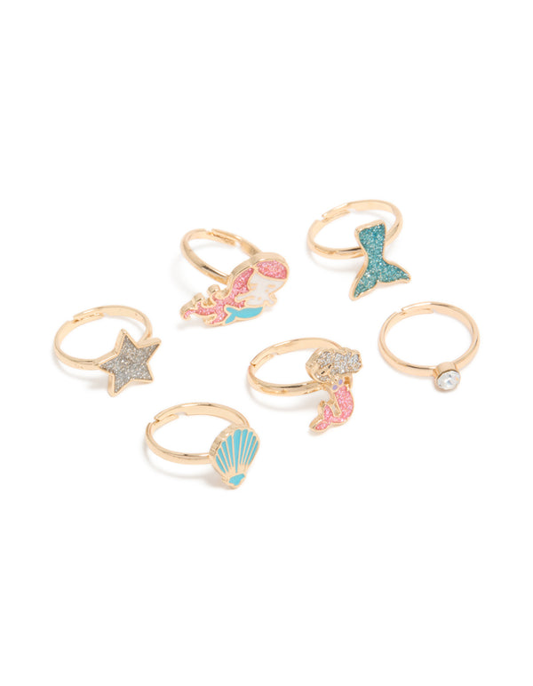 Showcasing kids' glitter, ocean and shell rings in gold, turquoise, pink front view