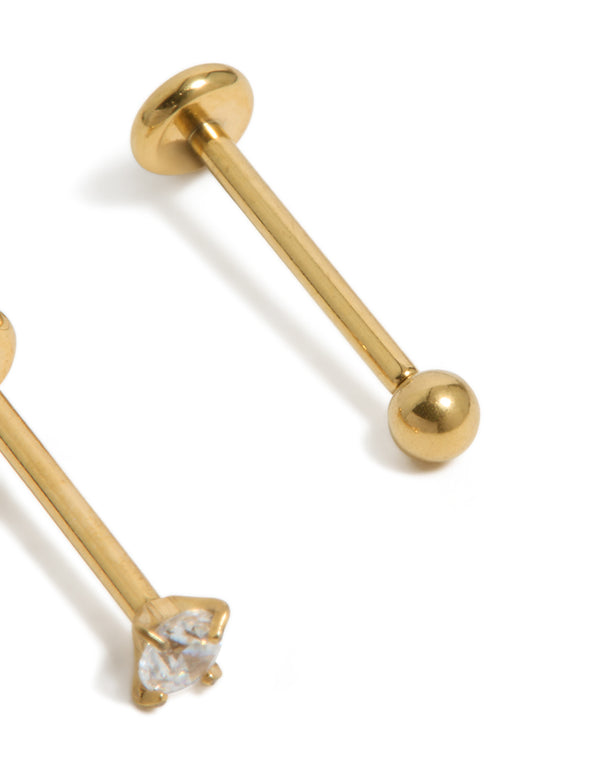 Highlighting gold plated titanium cubic zirconia threadless flat back nose stud with claw setting detail close up view