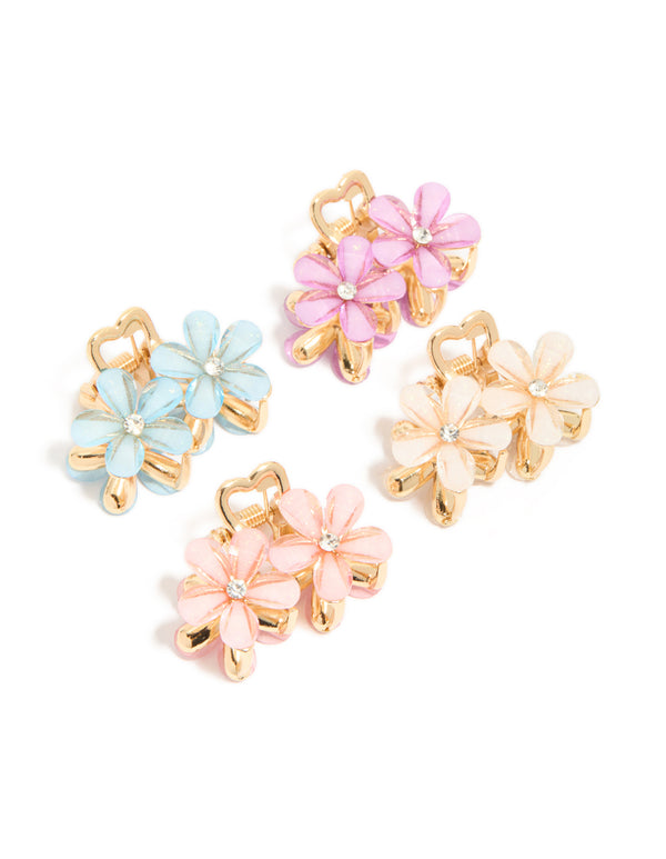 Featuring gold double flower diamante claw clips in a 4-pack with floral design clasp and pink, light blue, peachpuff accents side view