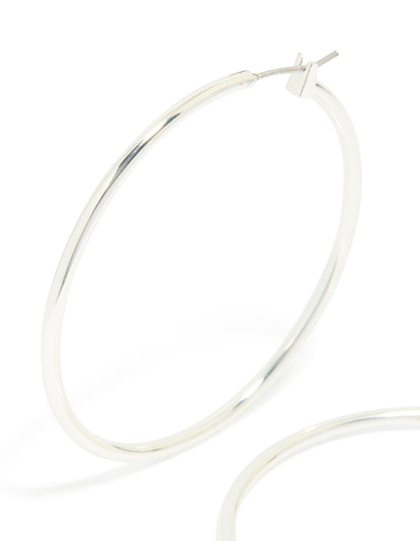 Beautifully designed large thin hoop earrings in silver plated material with closure close up view