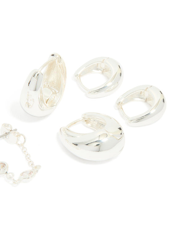 Crafted from silver plated metal these chain and huggie earrings 4-pack with huggie closures post detail view