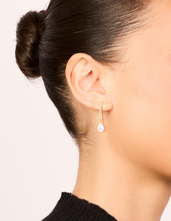 Elegant gold plated floating cubic zirconia hook earrings on ear view