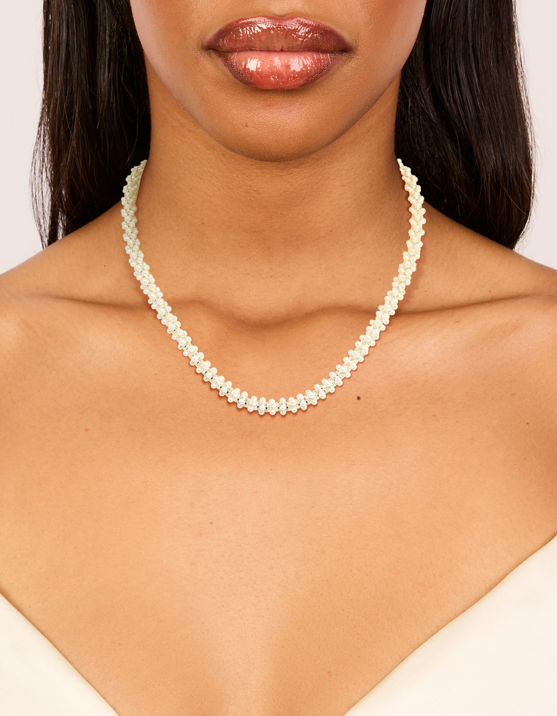 Beautifully crafted fireball pearl necklace from silver plated metal on neck view
