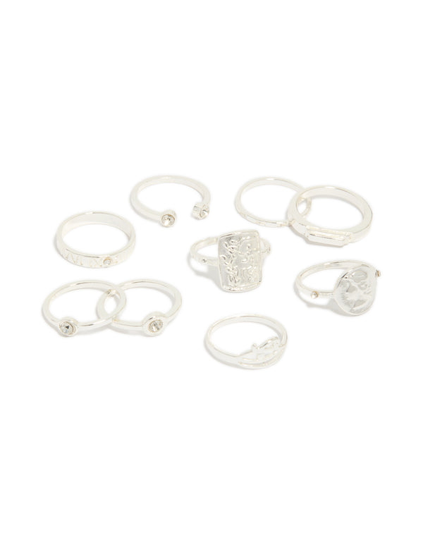 Showcasing a 9-pack of rings featuring Roman numeral and diamante designs in silver tones front view