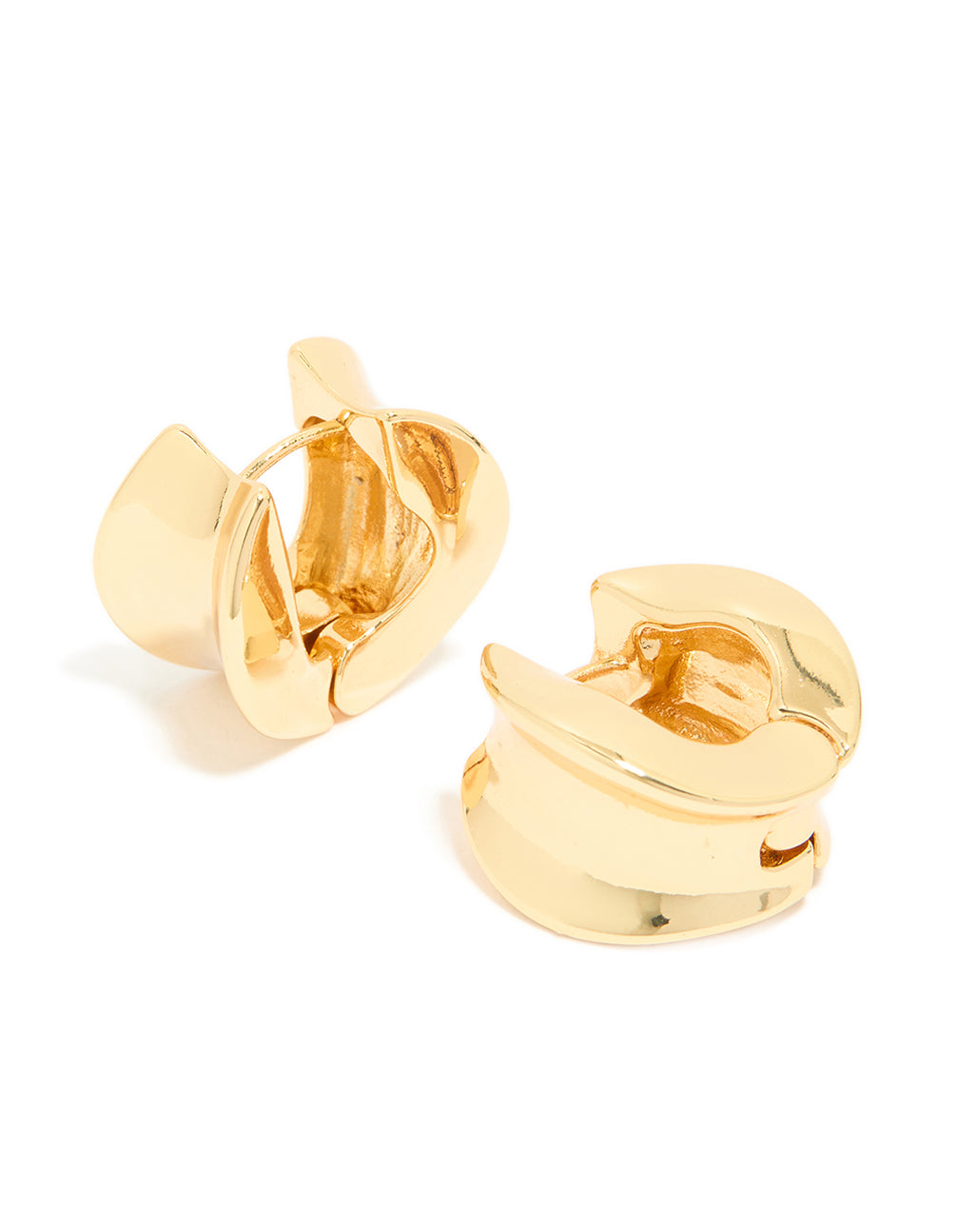 Featuring gold plated organic thick huggie earrings with chunky design front view