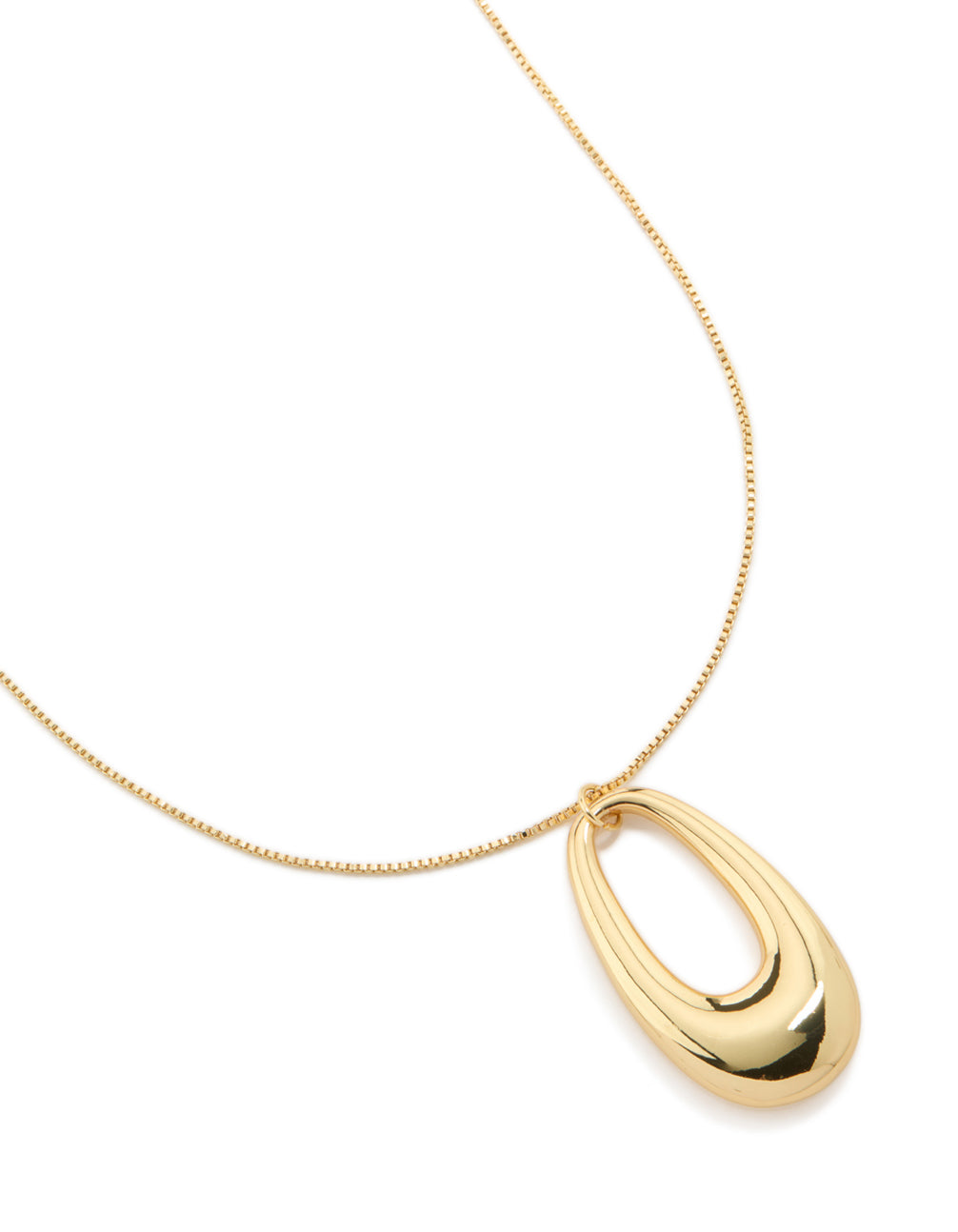 Discover this gold plated modern organic pendant statement necklace close up view