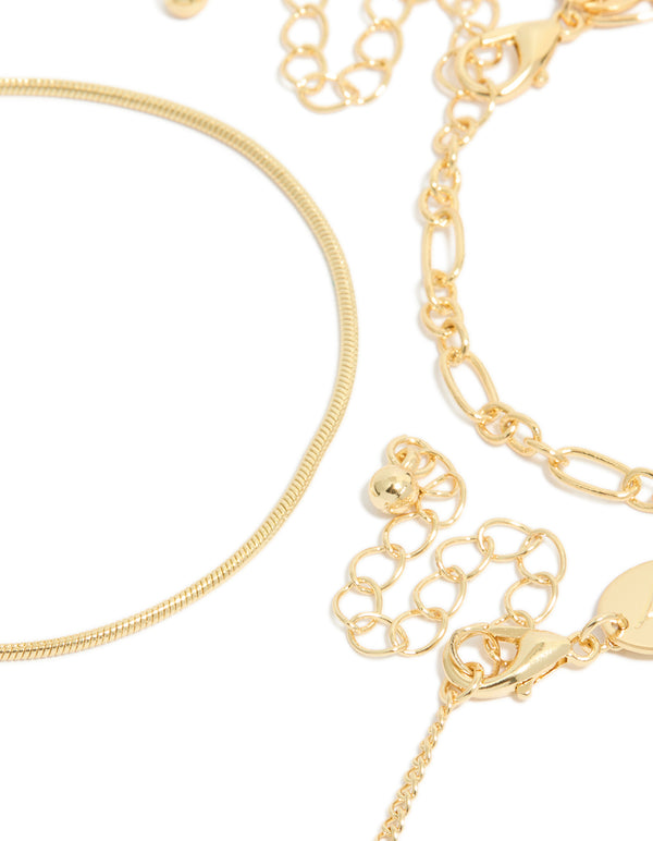 Featuring gold plated featuring cubic zirconia and chain bracelets in a 3-pack closure detail view