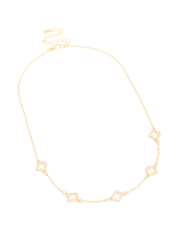 This gold plated necklace design features cubic zirconia flower charm front view