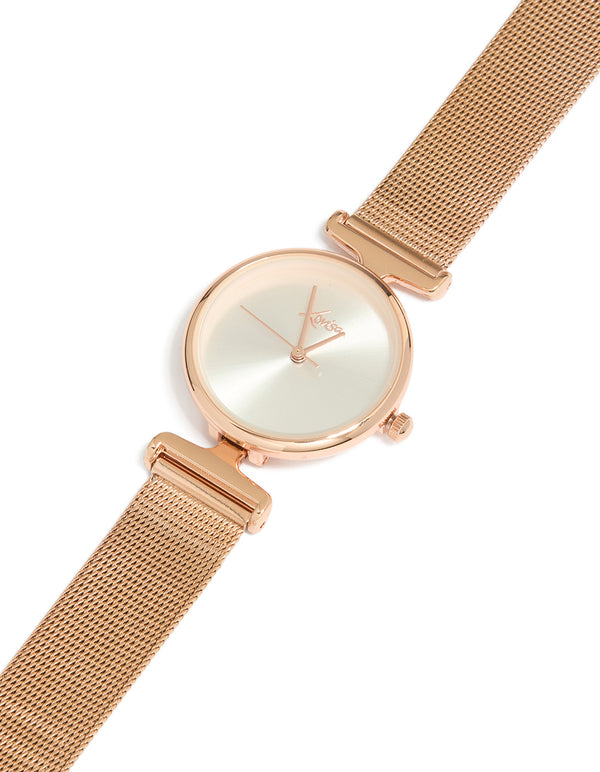 Discover this women's analog watch featuring white dial, round shape, casual styling, mesh strap in rose gold watch face detail view