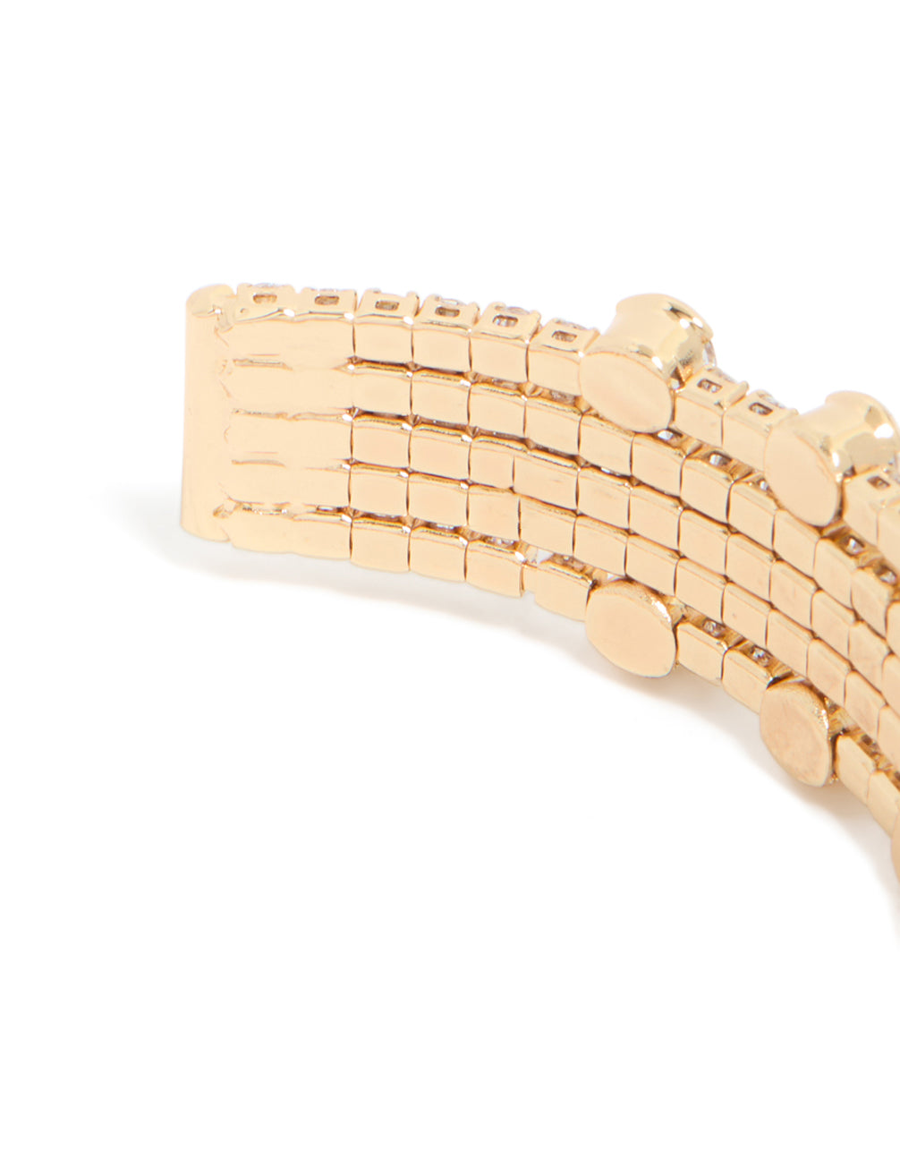 Displaying gold mini bezel set cubic zirconia wrist cuff closure detail view