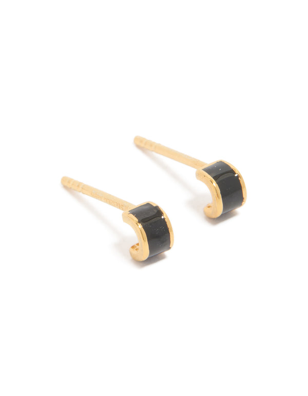 Discover tiny gold plated sterling silver stud earrings with black enamel accents front view